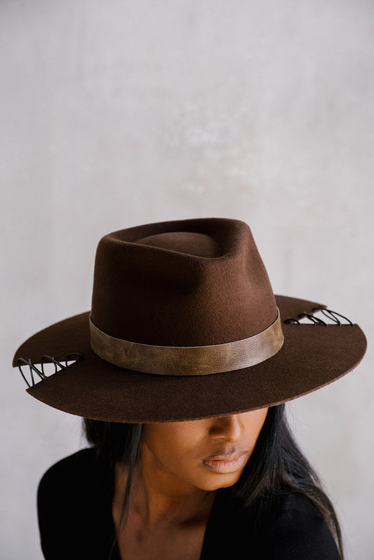 woman-wearing-the-cut-brown-fedora